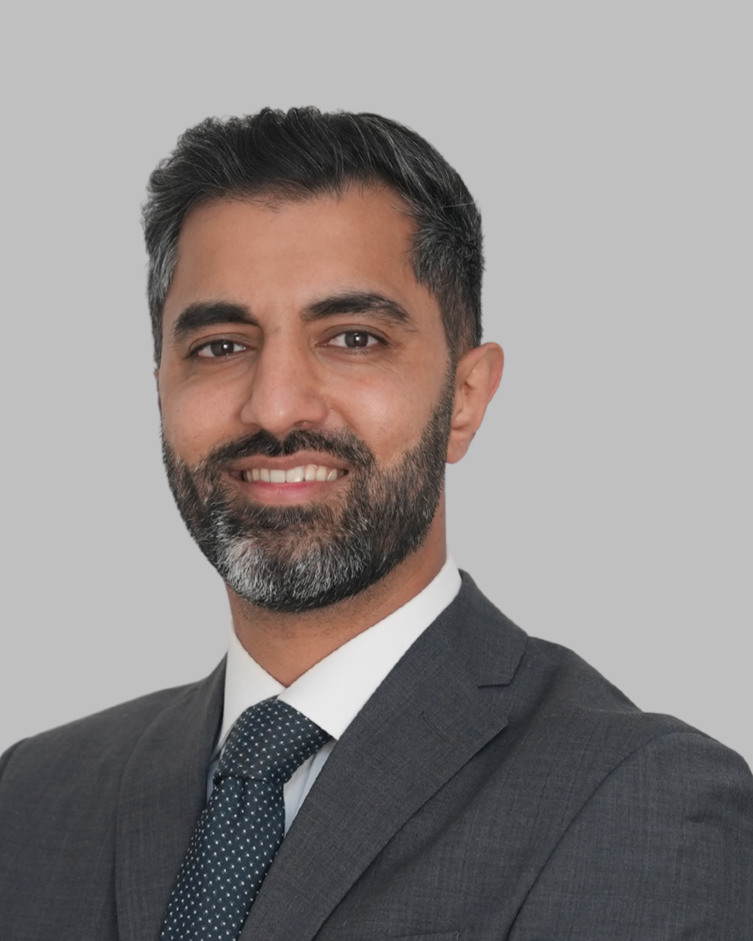 Dr. Junaid <br> Malik